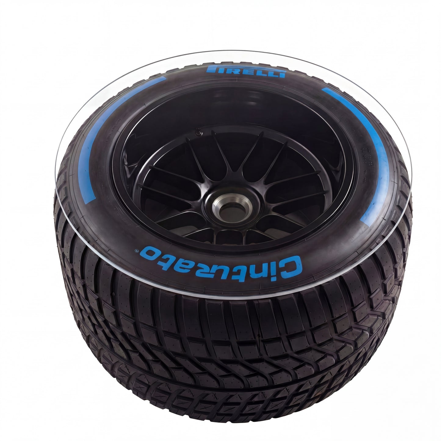 F1 coffee table with racing tire base and plexiglass top
